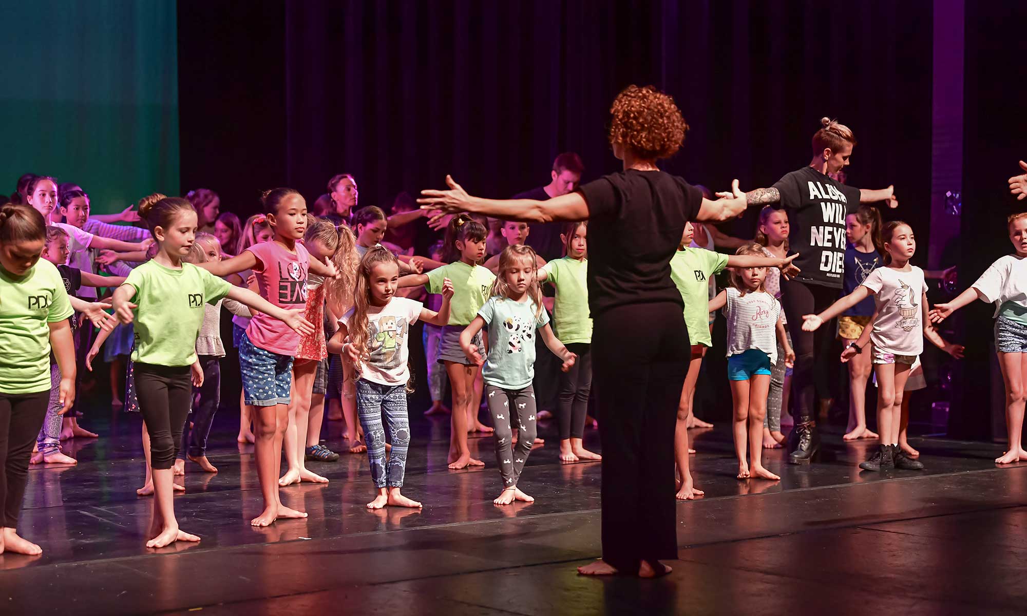 Dance classes warm up by Prince Dance Institute instructors